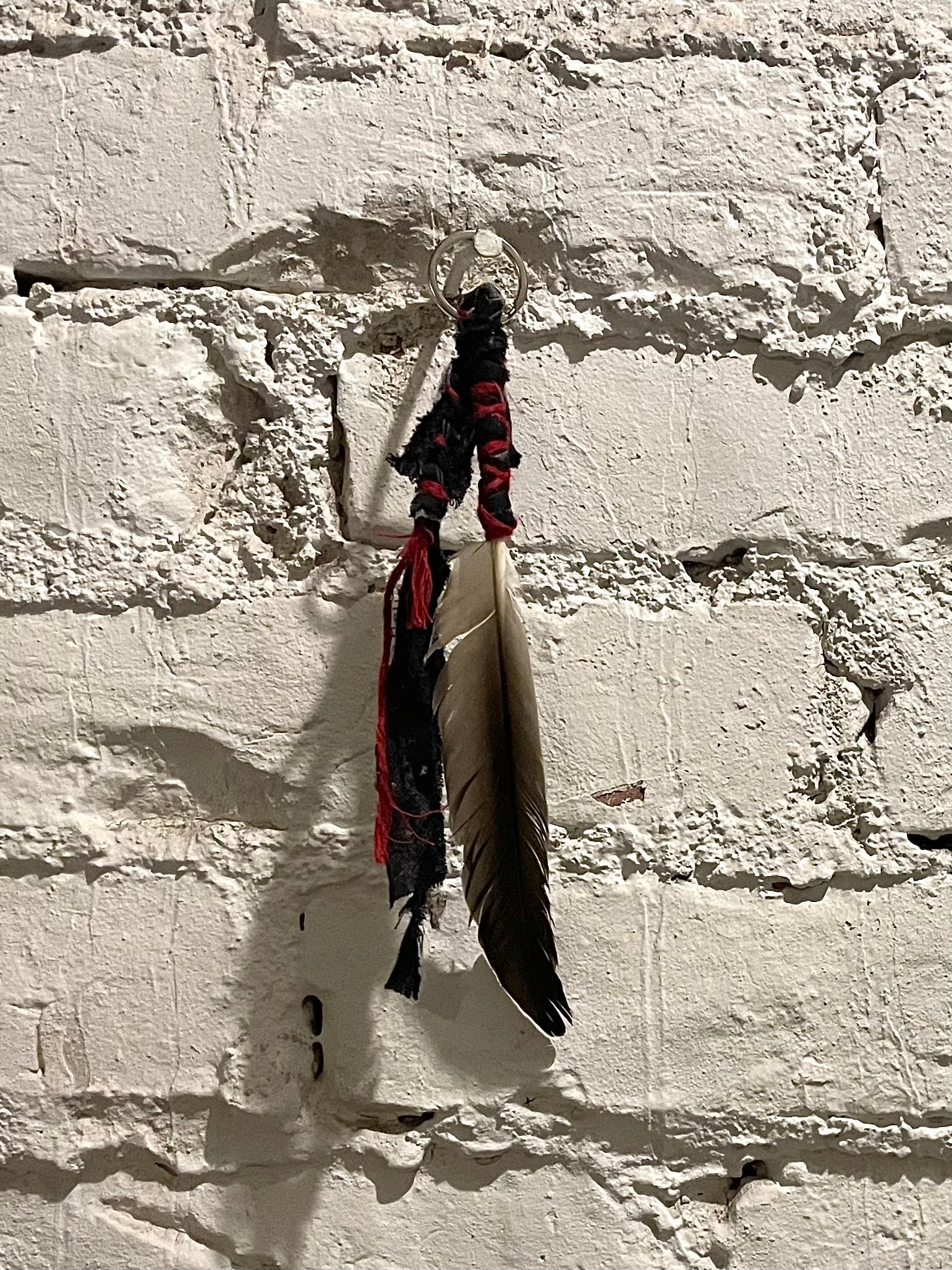 SAILOR'S FEATHER KEYCHAIN