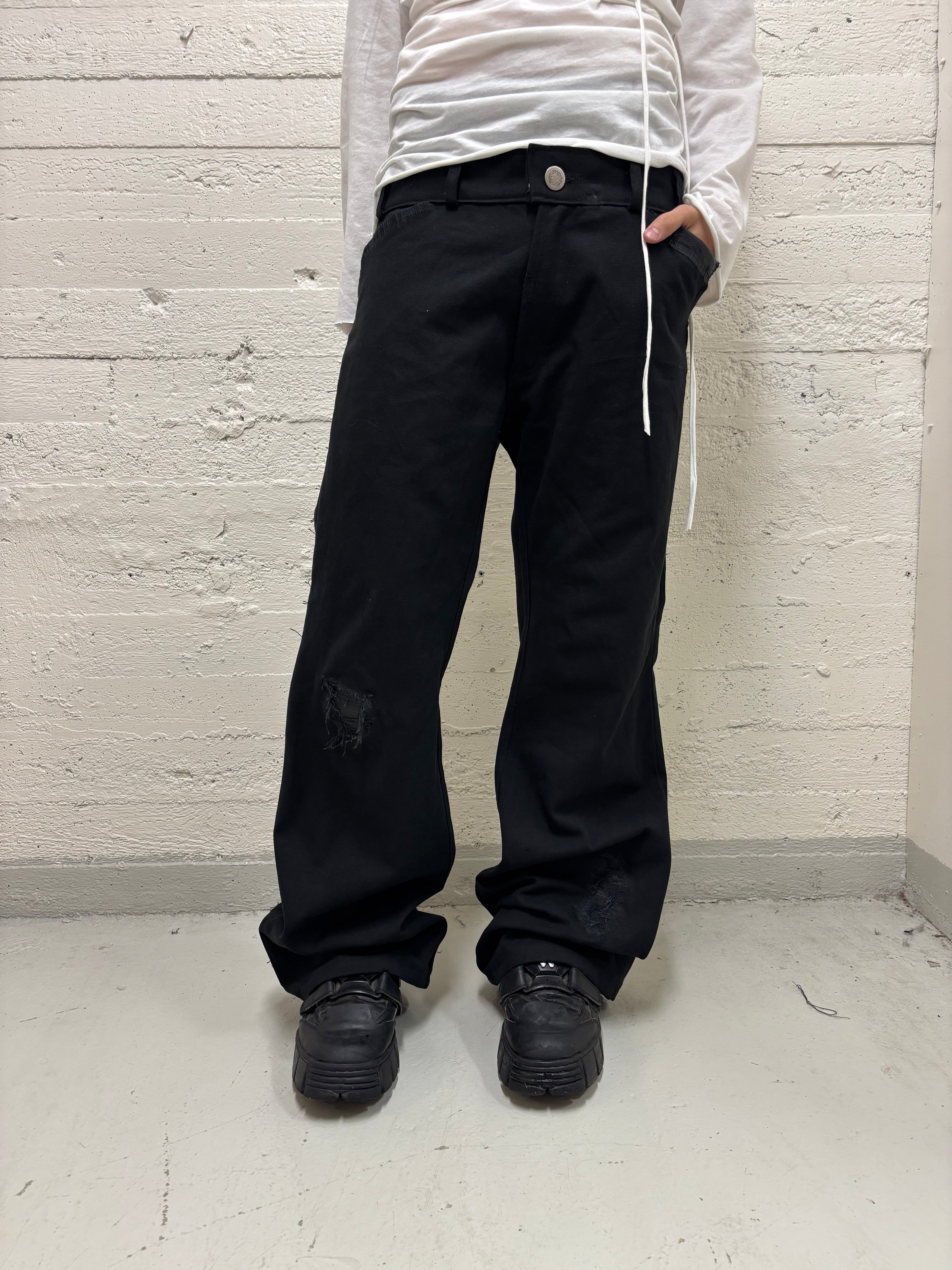 LEATHER REPAIRED TROUSERS