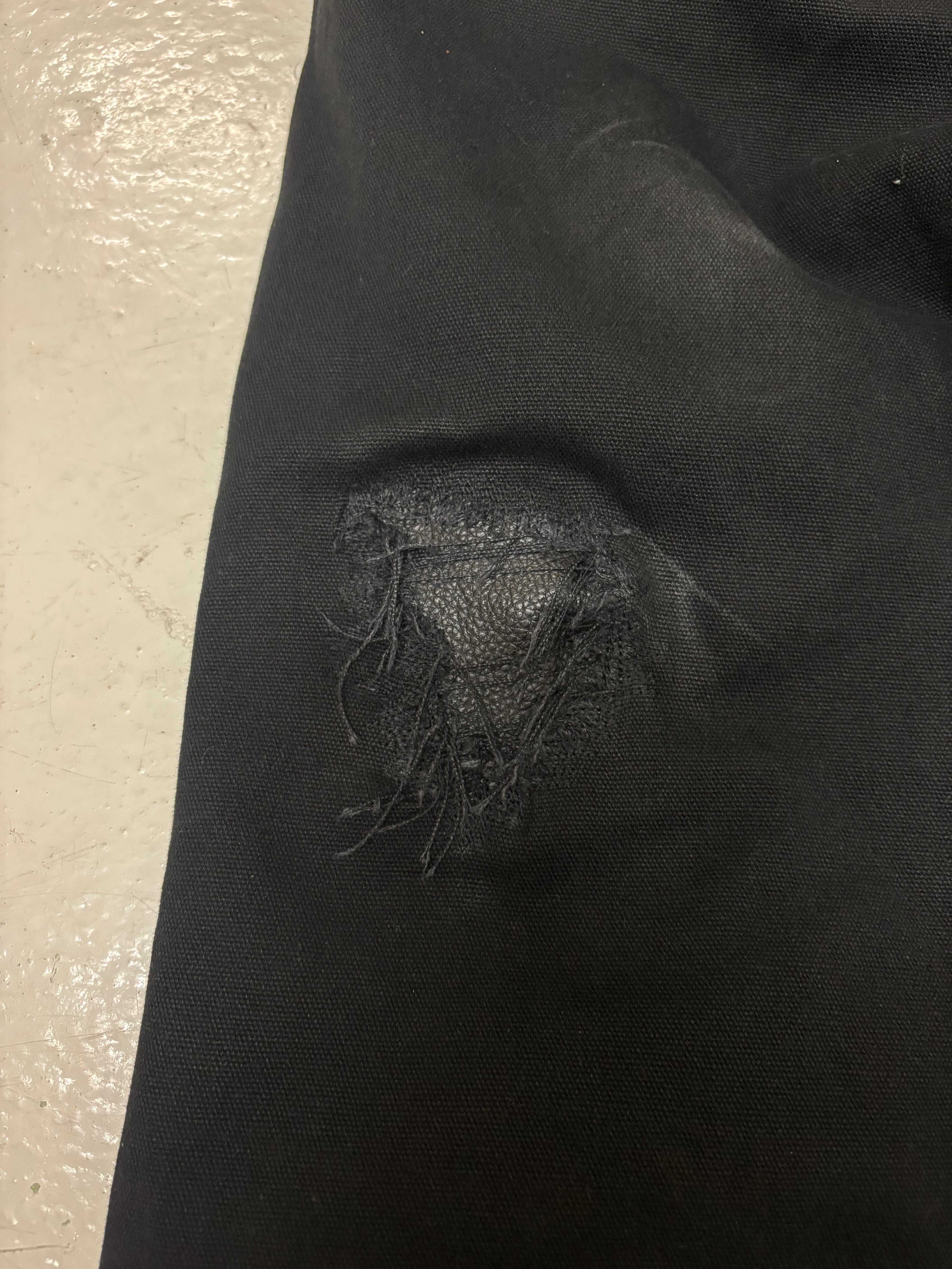 LEATHER REPAIRED TROUSERS